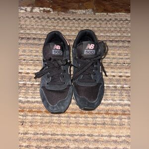 New Balance • Black Sneakers